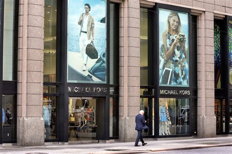 michael kors acquisition|capri merger news.